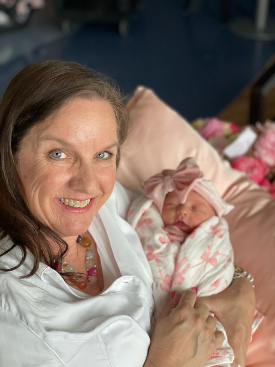 Mrs. Moffitt holding her new granddaughter a few days before Mother's Day | Arizona Reproductive Medicine | Phoenix, AZ