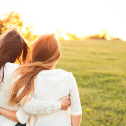 Two women looking at the sunset | Arizona Reproductive Medicine Specialists | Phoenix