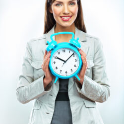 Woman holding a clock | Arizona Reproductive Medicine Specialists | Phoenix